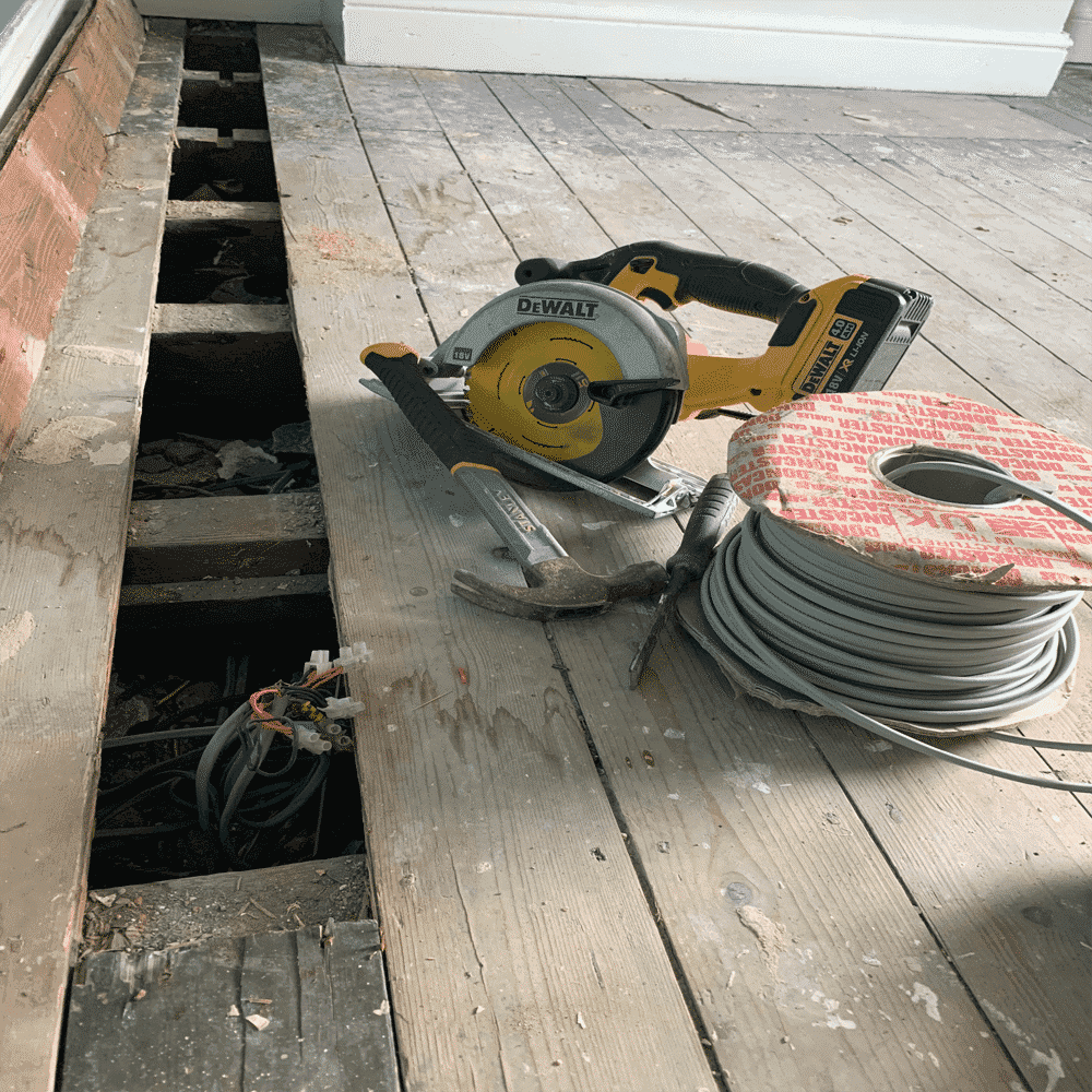 house-rewire-floorboard-access
